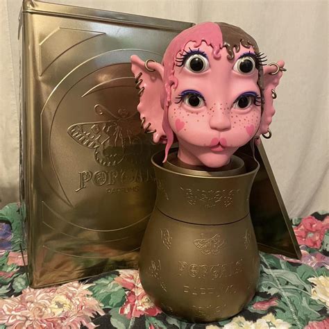 melanie martinez portals perfume statue